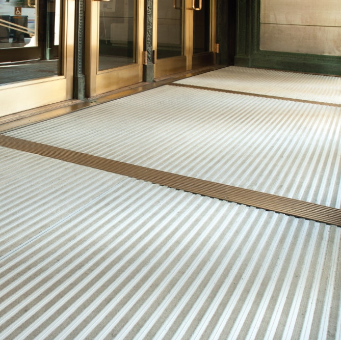 Explore entry and matting solutions in the Arrival Colleciton from Matter Surfaces.